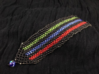 Black, Red, Blue & Green Peyote Bracelet